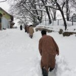 Flight operations resume at Srinagar airport after clearing snow from runway